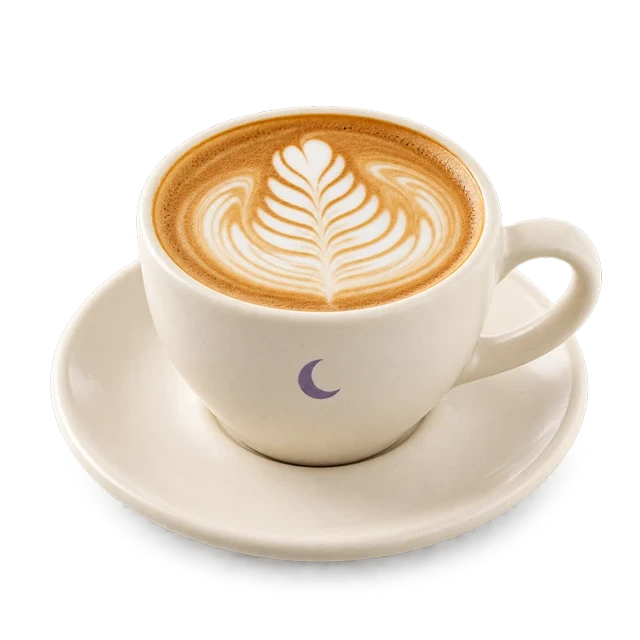 Flat white in an ivory cup with a violet moon